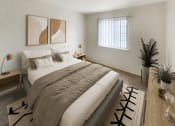 Thumbnail 9 of 19 - a bedroom with a large bed and a window
