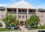 Thumbnail 9 of 9 - A building with a sign that says