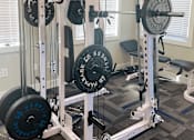 Thumbnail 9 of 13 - gym has a weight machine