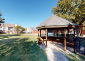 Thumbnail 24 of 24 - a gazebo sits in the middle of a grassy area