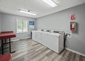 Thumbnail 21 of 27 - Laundry Facility at Ardsley Ridge Apartments