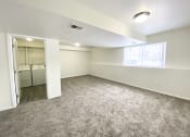 Thumbnail 7 of 32 - Finished Basement at Grand Rapids townhomes
