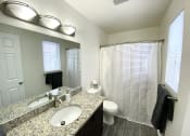 Thumbnail 5 of 32 - Granite Countertop Upgrade in a Large Bathroom at Bloomfield Townhomes