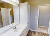 Thumbnail 20 of 32 - bright bathroom with a big mirror