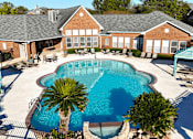 Thumbnail 28 of 32 - large swimming pool at an apartment building