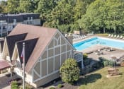 Thumbnail 26 of 29 - Beautiful clubhouse and pool at bavarian woods apartments