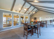 Thumbnail 11 of 24 - seating area in clubhouse at Camelot apartments