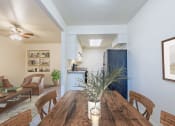 Thumbnail 2 of 24 - Kitchen and Dining room in apartment at Camelot Apartments