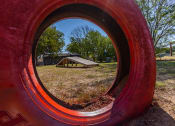 Thumbnail 14 of 24 - apartment dog park at Camelot Apartments