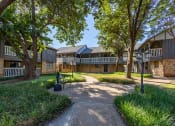 Thumbnail 19 of 24 - Beautiful landscaping at camelot apartments