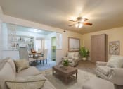 Thumbnail 3 of 24 - Connected Living and Dining Area