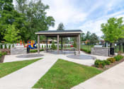Thumbnail 22 of 27 - covered picnic area at Grand Rapids Apartments