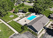 Thumbnail 40 of 41 - A house with a pool in the backyard.