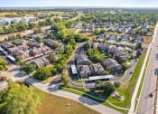 Thumbnail 26 of 30 - an aerial view of a neighborhood with houses