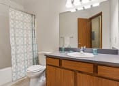 Thumbnail 14 of 26 - bathroom with a shower, toilet and sink