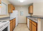 Thumbnail 5 of 26 - apartment kitchen with white appliances