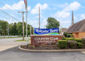 Thumbnail 25 of 26 - welcome sign at Country Club Apartments