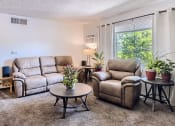Thumbnail 2 of 34 - Great natural light in living room with carpeted floors
