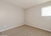 Thumbnail 6 of 13 - apartment bedroom with carpet and a window