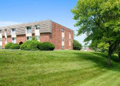 Thumbnail 11 of 13 - apartment complex with beautiful landscaping