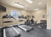 Thumbnail 20 of 34 - the fitness center at Candlelight Park in Davenport, IA