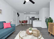 Thumbnail 5 of 33 - Apartment floor plan with a blue couch and a coffee table