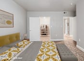 Thumbnail 4 of 16 - A bedroom with a bed and a painting on the wall.