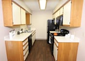 Thumbnail 3 of 23 - Fully Equipped Kitchen at Cross Creek Apartments