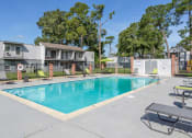 Thumbnail 17 of 22 - apartment complex with swimming pool