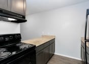 Thumbnail 5 of 22 - apartment kitchen Breakfast Bar
