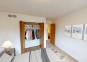 Thumbnail 7 of 18 - Bedroom of apartment in Southfield, Michigan with large closet.