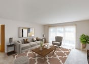 Thumbnail 2 of 18 - Living room with natural light at Chateau Riviera
