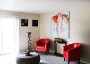 Thumbnail 3 of 31 - a living room with balcony