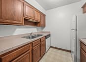 Thumbnail 4 of 25 - apartment kitchen with cabinets