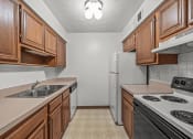 Thumbnail 6 of 25 - Apartment Kitchen with Dishwasher