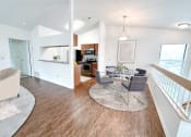 Thumbnail 2 of 31 - an open floor plan with a dining area and kitchen