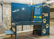 Thumbnail 17 of 24 - A blue booth with a sign that says