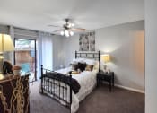 Thumbnail 8 of 22 - spacious bedroom with ceiling fan and large window