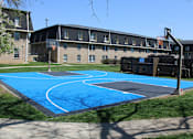 Thumbnail 23 of 27 - Apartment community with basketball court