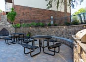 Thumbnail 12 of 31 - Community area with fire pit and grill