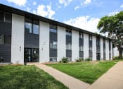 Thumbnail 1 of 18 - East Edge Apartments Exterior and Landscaping