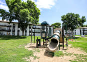Thumbnail 15 of 18 - playground at apartment community