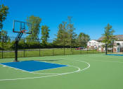 Thumbnail 15 of 31 - the basketball court at the enclave at blue sky apartments ga
