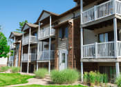 Thumbnail 1 of 31 - an exterior view of an apartment building with balconies