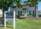 Thumbnail 27 of 31 - a leasing office sign in front of a house