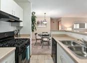 Thumbnail 6 of 28 - Apartment Kitchen with Gas Range and Dishwasher