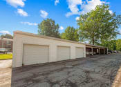 Thumbnail 16 of 24 - apartment community with garages