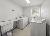 Thumbnail 11 of 24 - Laundry Facilities in Each Apartment Building