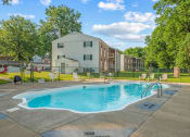 Thumbnail 14 of 24 - apartment complex with outdoor pool
