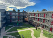 Thumbnail 24 of 28 - Outdoor space between buildings at south federal apartments in denver